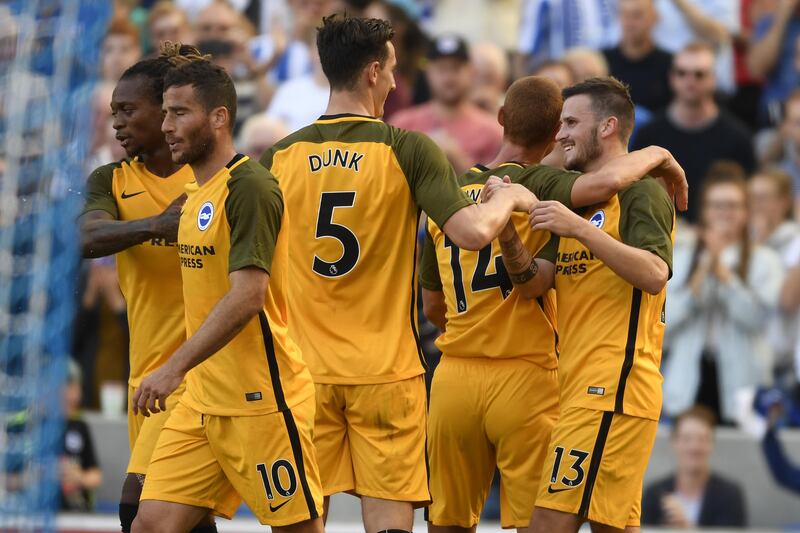 BRIGHTON, ENGLAND - AUGUST 06:  Pascal Gross of Brighton (R) celebrates with team mates after scoring  during a Pre Season Friendly between Brighton & Hove Albion and Atletico Madrid at Amex Stadium on August 6, 2017 in Brighton, England.  (Photo by Mike Hewitt/Getty Images)