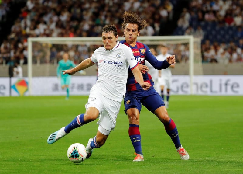 Barcelona's Antoine Griezmann, right, in action with Chelsea's Andreas Christensen during the Rakuten Cup match at Saitama Stadium in Japan. Chelsea won 2-1. Reuters