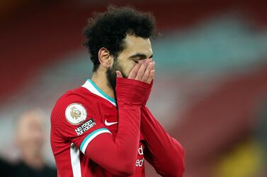 LIVERPOOL, ENGLAND - JANUARY 21: Mohamed Salah of Liverpool reacts during the Premier League match between Liverpool and Burnley at Anfield on January 21, 2021 in Liverpool, England. Sporting stadiums around the UK remain under strict restrictions due to the Coronavirus Pandemic as Government social distancing laws prohibit fans inside venues resulting in games being played behind closed doors. (Photo by Clive Brunskill/Getty Images)