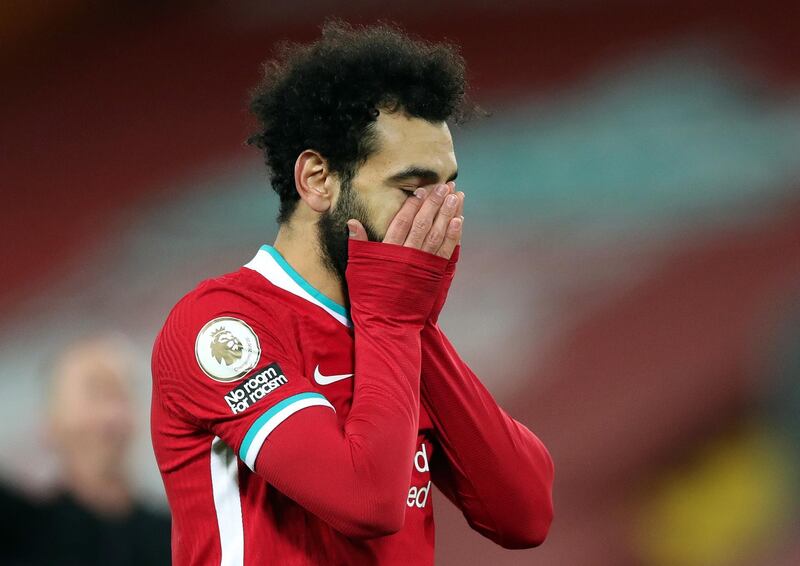 LIVERPOOL, ENGLAND - JANUARY 21: Mohamed Salah of Liverpool reacts during the Premier League match between Liverpool and Burnley at Anfield on January 21, 2021 in Liverpool, England. Sporting stadiums around the UK remain under strict restrictions due to the Coronavirus Pandemic as Government social distancing laws prohibit fans inside venues resulting in games being played behind closed doors. (Photo by Clive Brunskill/Getty Images)