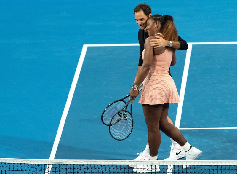 epa07257135 Roger Federer of Switzerland and Serena Williams of the USA leave the court after playing in the mixed doubles match between Roger Federer and Belinda Bencic of Switzerland and Frances Tiafoe and Serena Williams of the USA on day 4 of the Hopman Cup tennis tournament at RAC Arena in Perth, Western Australia, Australia, 01 January 2019.  EPA/RICHARD WAINWRIGHT AUSTRALIA AND NEW ZEALAND OUT  EDITORIAL USE ONLY