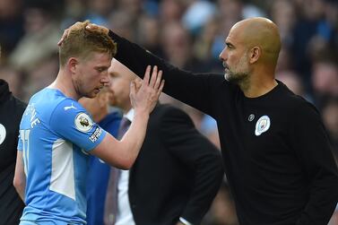 Kevin De Bruyne of Manchester City (L) is comforted by Manchester City manager Pep Guardiola (R) as he leaves the pitch during the English Premier League soccer match between Manchester City and Burnley in Manchester, Britain, 16 October 2021.   E  EPA/PETER POWELL EDITORIAL USE ONLY.  No use with unauthorized audio, video, data, fixture lists, club/league logos or 'live' services.  Online in-match use limited to 120 images, no video emulation.  No use in betting, games or single club / league / player publications