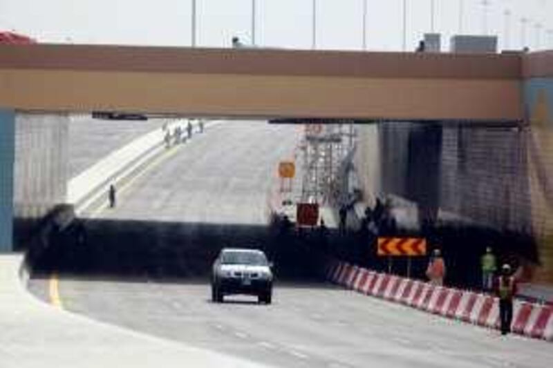 February 15, 2010/ Abu Dhabi / Construction crews put the finishing touches on the Salam Street tunnel, which, will open to traffic on February 18, 2010 6 months ahead of schedule in Abu Dhabi February 15, 2010. (Sammy Dalla / The Natonal)



