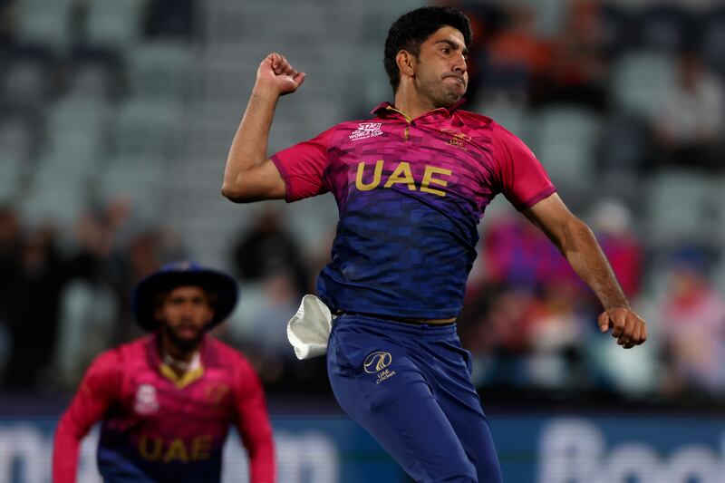 UAE's Junaid Siddique celebrates bowling out Netherlands' Roelof van der Merwe. AP