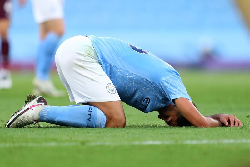 MANCHESTER, ENGLAND - SEPTEMBER 27: Rodrigo of Manchester City looks dejected during the Premier League match between Manchester City and Leicester City at Etihad Stadium on September 27, 2020 in Manchester, England. Sporting stadiums around the UK remain under strict restrictions due to the Coronavirus Pandemic as Government social distancing laws prohibit fans inside venues resulting in games being played behind closed doors. (Photo by Catherine Ivill/Getty Images)