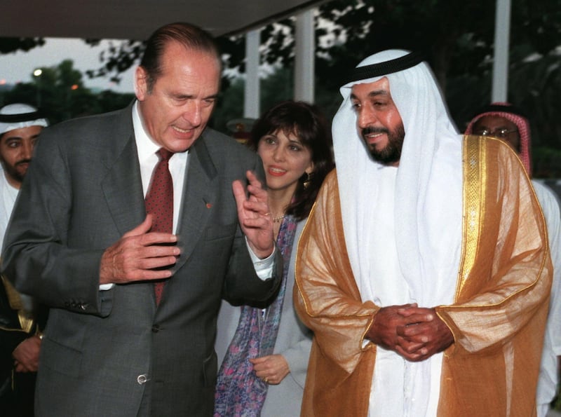 French President Jacques Chirac (L) speaks with Crown Prince Sheikh Khalifa bin Zaid al-Nahayan (R) of Abu Dhabi at the end of his visit in the UAE, December 16. - RTXH2DX