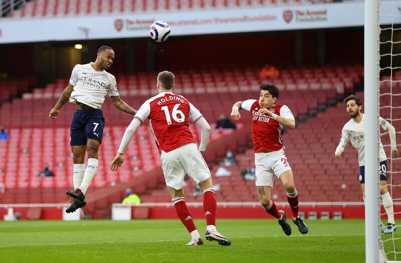 Raheem Sterling heads home for Manchester City. Getty