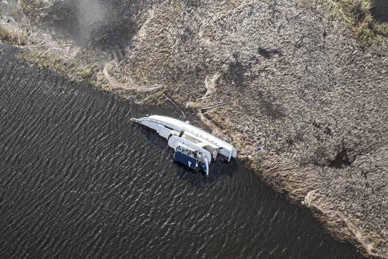 A boat lies capsized on the Cape Fear River after Hurricane Florence hit in Wilmington, North Carolina. Alex Wroblewski/Bloomberg