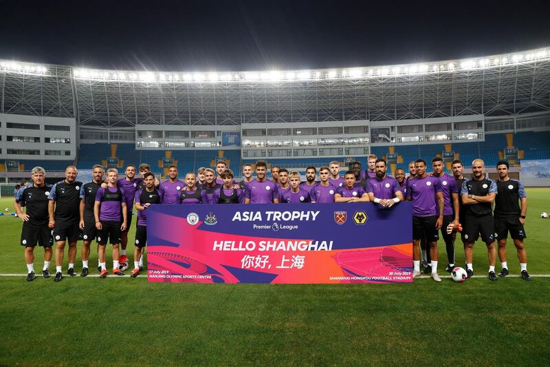 The Manchester City squad pose for a team photograph.