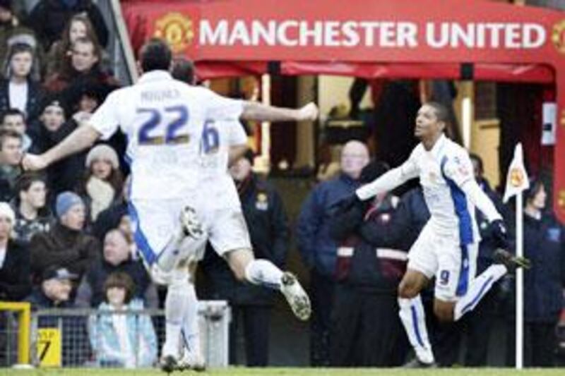 Jermaine Beckford, right, celebrates his 19th-minute goal which secured a dramatic FA Cup victory for Leeds United.