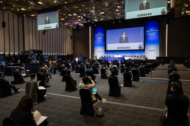 Attendees are socially distanced during the Samsung Electronics Co. annual general meeting at the Suwon Convention Center in Suwon, South Korea. Bloomberg