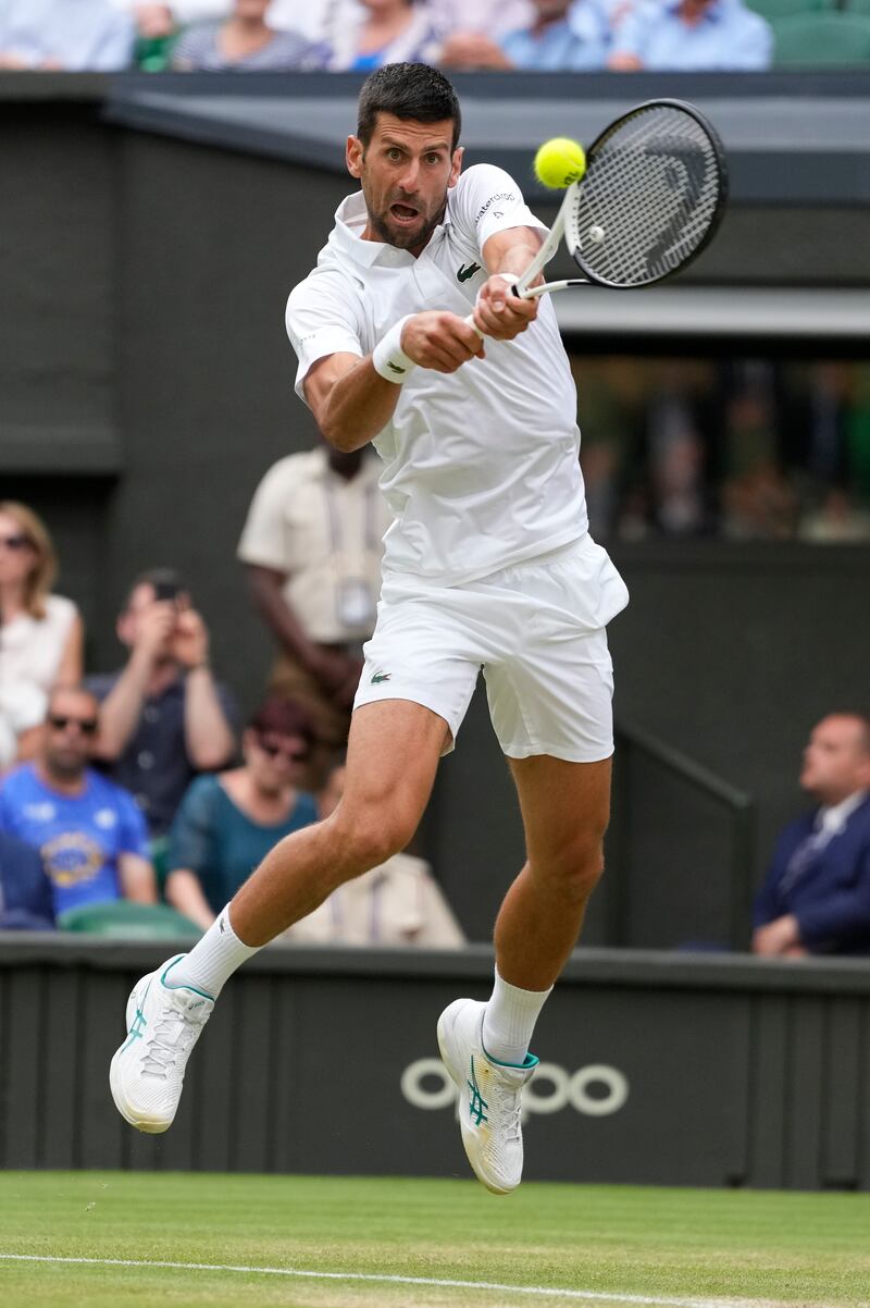Serbia's Novak Djokovic returns. AP 