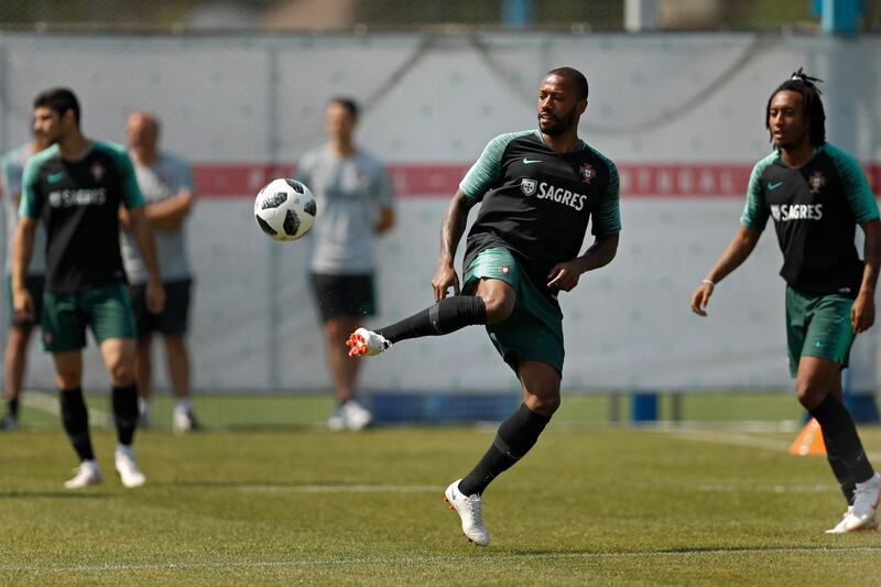 Manuel Fernandes plays the ball during the training session. Francisco Seco / AP Photo