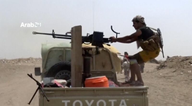 Shots are fired from a vehicle during heavy fighting between the Yemeni government and Houthis in Hodeidah, Yemen, in this still image taken from video obtained on December 18, 2018. MANDATORY CREDIT ARAB 24/via REUTERS TV ATTENTION EDITORS - THIS IMAGE HAS BEEN SUPPLIED BY A THIRD PARTY. NO RESALES. NO ARCHIVES. MANDATORY CREDIT