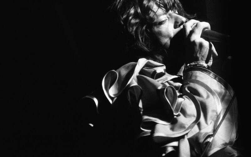 Mick Jagger of the Rolling Stones in concert at Knebworth, 21st August 1976. (Photo by Graham Wood/Evening Standard/Hulton Archive/Getty Images)