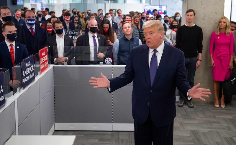 US President Donald Trump speaks as he visits his campaign headquarters in Arlington, Virginia. AFP