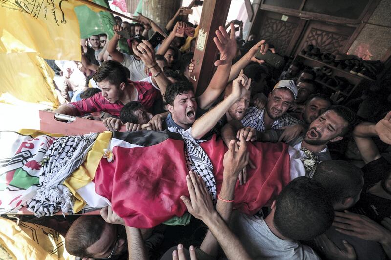 Thousands turned out for the funeral of Tamer Sultan, a 38-year old activist and father for two who fled the Gaza strip to escape Hamas repression and in search of a future but died of cancer in Bosnia. Majd Mahmoud for The National
