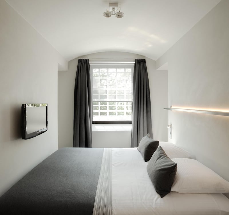 Each bedroom has kept its original door. Courtesy Hotel Het Arresthuis