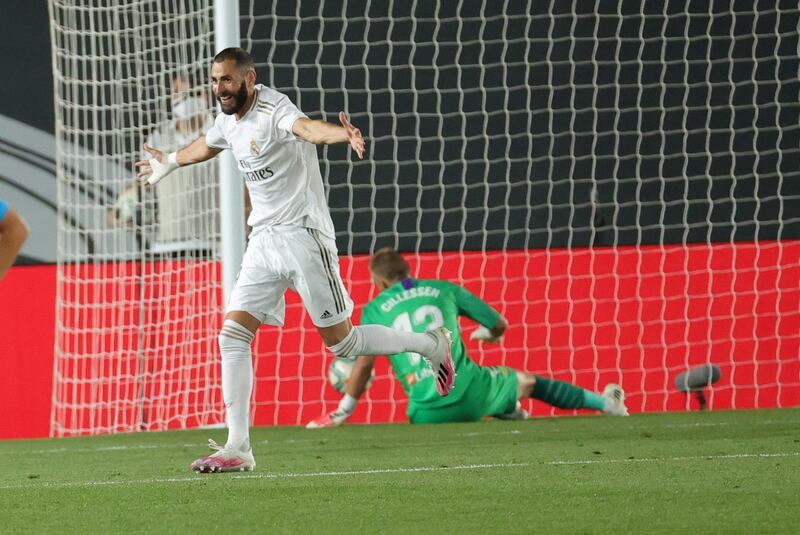 Real Madrid's striker Karim Benzema celebrates after scoring the third goal against Valencia. EPA