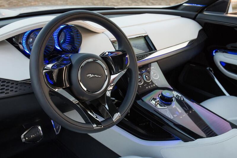 The interior offers interactive technology, with individual bucket seats for comfort. Courtesy Jaguar
