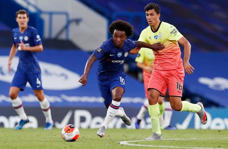 Chelsea's Willian brushed off the challenge of Rodri of Manchester City. Reuters