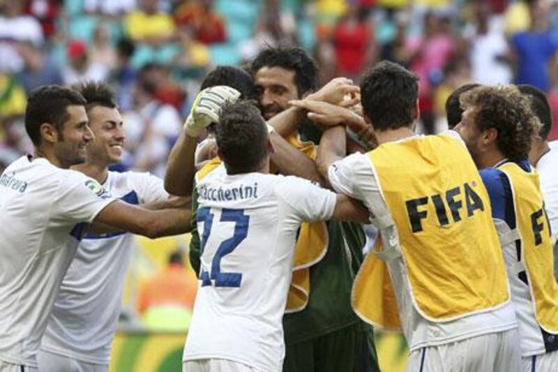 Gianluigi Buffon made three magnificent saves as Italy won third place at the Confederations Cup.
