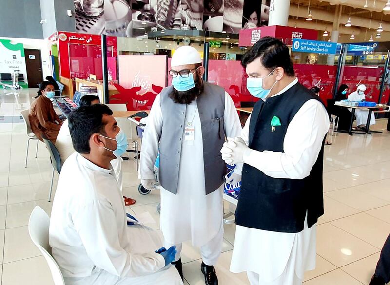 Pakistan consul-general Ahmed Ali at the Dubai International Airport during one of the repatriation flights on May 15. Courtesy: Pakistan Consulate 