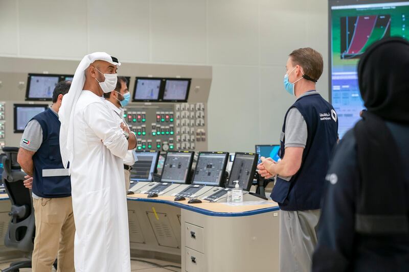 AL DHAFRA, ABU DHABI, UNITED ARAB EMIRATES - June 11, 2020: HH Sheikh Mohamed bin Zayed Al Nahyan, Crown Prince of Abu Dhabi and Deputy Supreme Commander of the UAE Armed Forces (L) inspects the Barakah Peaceful Nuclear Energy Plants, in Barakah.

( Mohamed Al Hammadi / Ministry of Presidential Affairs )
---