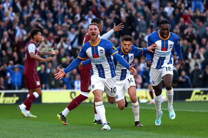 Alexis Mac Allister celebrates scoring Brighton's opener. Getty