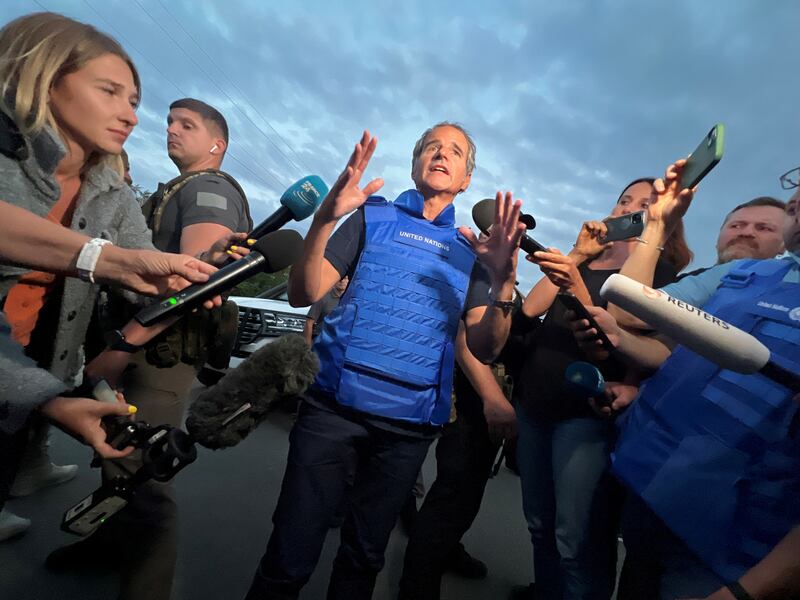 Mr Grossi speaks with journalists after he and a part of the IAEA mission returned from inspections. Reuters