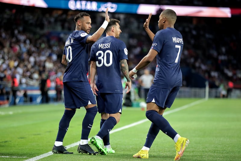 PSG's Neymar, Kylian Mbappe and Lionel Messi celebrate scoring against Montpellier. EPA