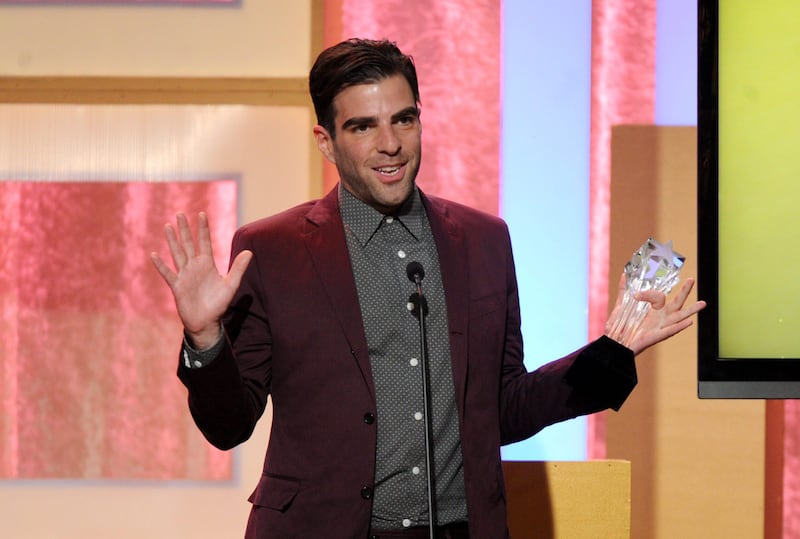 Zachary Quinto accepts award for best supporting actor in a movie or mini-series for "American Horror Story: Asylum" at the Critics' Choice Television Awards in the Beverly Hilton Hotel on Monday, June 10, 2013, in Beverly Hills, Calif. (Photo by Frank Micelotta/Invision/AP) *** Local Caption ***  2013 Critics Choice Television Awards - Show.JPEG-057a6.jpg