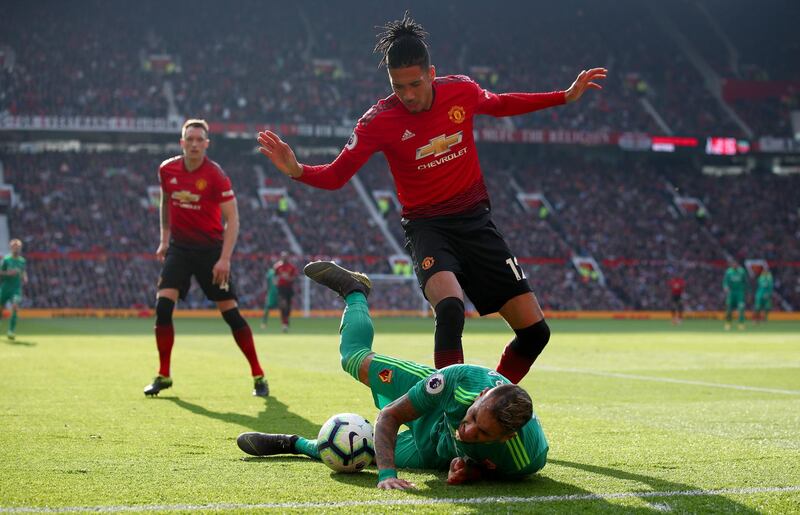 Watford's Roberto Pereyra of Watford is fouled by United's Chris Smalling. Getty