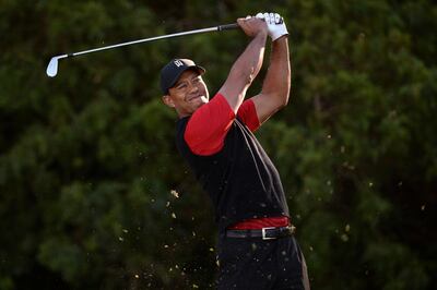 FILE PHOTO:    Jan 28, 2018; San Diego, CA, USA; Tiger Woods plays his shot from the 11th tee during the final round of the Farmers Insurance Open golf tournament at Torrey Pines Municipal Golf Course - South Co. Mandatory Credit: Orlando Ramirez-USA TODAY Sports/File Photo