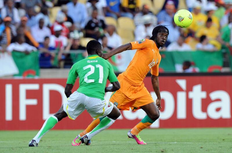 Ivory Coast forward Gervinho, right, vies with Togo defender Dakonam Djene during the 2013 African Cup of Nations in Rustenburg, South Africa, on January 22, 2013 at Royal Bafokeng Stadium. Alexander Joe / AFP