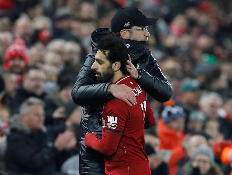 Mohamed Salah is embraced by manager Juergen Klopp after being substituted. against Palace. Reuters