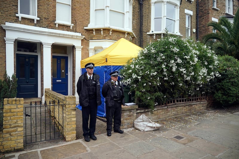 Police officers outside a house in north London, thought to be in relation to the investigation into the death of Conservative MP Sir David Amess. AP