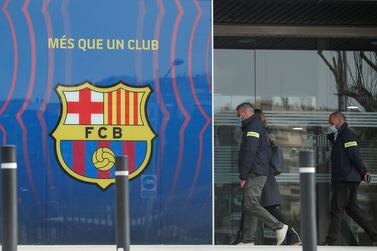 Mossos d'Esquadra police officers enter the offices of FC Barcelona in Barcelona, Spain, March 1, 2021. REUTERS/Albert Gea