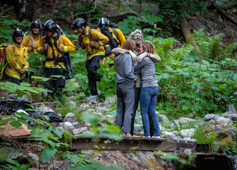 Hiker Lukas McClish, 34, is reunited with his family in rural Boulder Creek after going missing for 10 days in the mountains of Northern California, US. AP