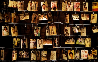 Family photographs of some of those who died in 1994 on display in an exhibition at the Kigali Genocide Memorial. The challenge for the country has been to build a spirit of national unity in the decades after the genocide. AP
