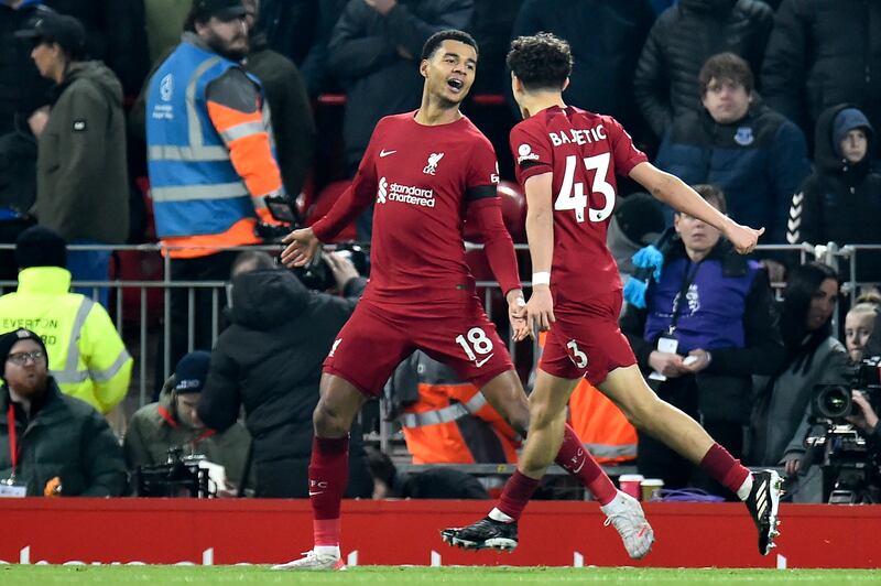 Cody Gakpo celebrates with teammate Stefan Bajcetic after scoring Liverpool's second goal during the Premier League match against Everton at Anfield in Liverpool, England on February 13 2023. EPA