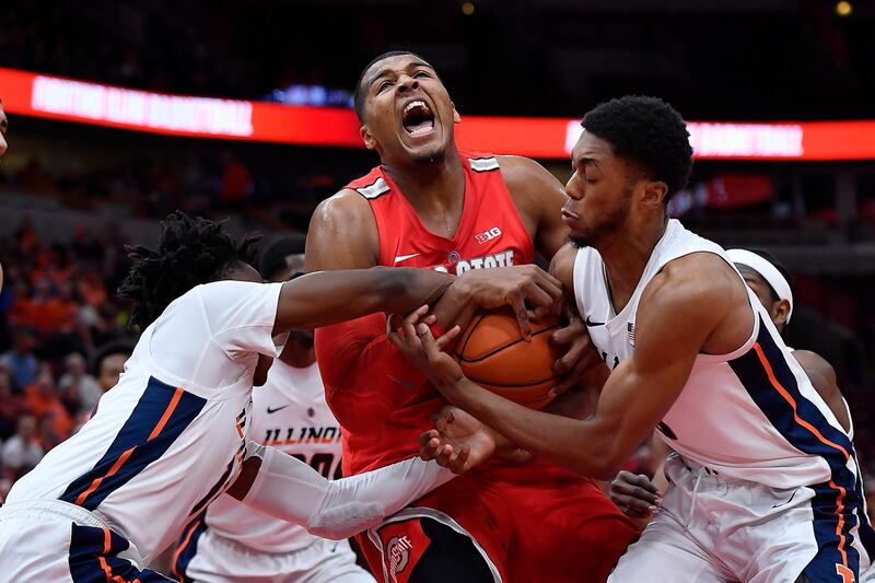 Ohio State Buckeyes forward Kaleb Wesson battles for the ball with Illinois Fighting Illini guards Ayo Dosunmu and Alan Griffin during a match in Chicago. Reuters