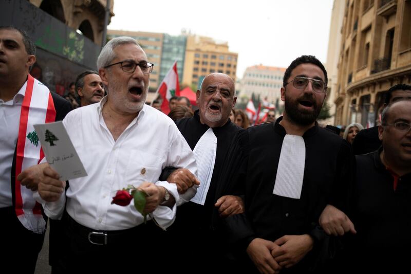 Lebanese judges and judicial employees shout slogans as they take part in ongoing anti-government protests in downtown Beirut, Lebanon, October 26, 2019. REUTERS/Alkis Konstantinidis
