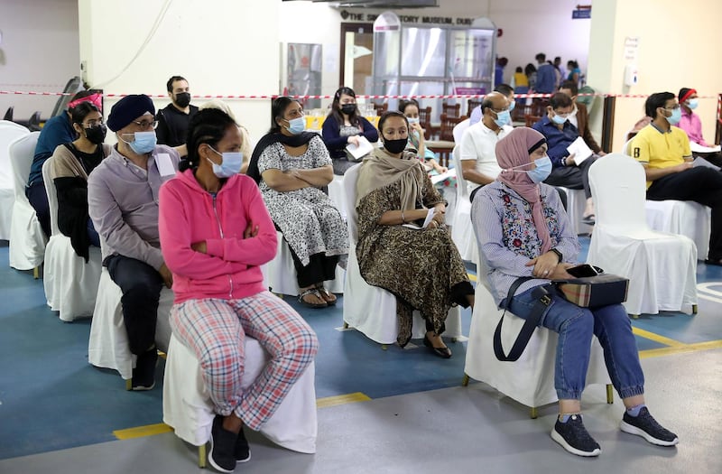 DUBAI, UNITED ARAB EMIRATES , Feb 6 – PEOPLE WAITING TO GET THE FIRST DOSE OF SINOPHARM VACCINATION DURING THE VACCINATION DRIVE AT THE GURU NANAK DARBAR GURUDWARA IN DUBAI. Guru Nanak Darbar Gurudwara has partnered with Tamouh Health Care LLC, to provide on-site Sinopharm Vaccination for all residents of the UAE free of charge on 6th, 7th & 8th February 2021. (Pawan Singh / The National) For News/Online