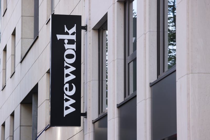 WeWork cited sustained losses and cancelled memberships to its office spaces. Getty Images