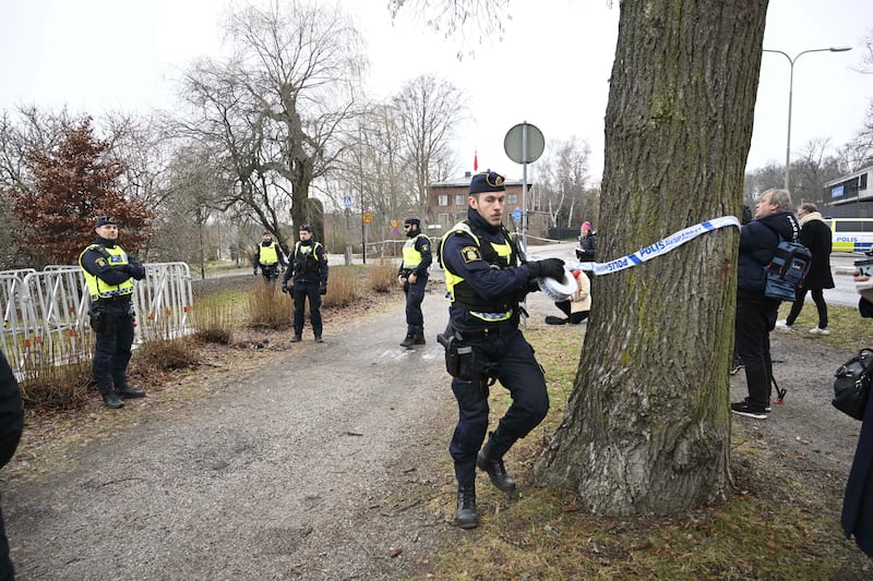 Police cordon off an area outside the Turkish embassy in Stockholm after a Quran was burnt in January. AP
