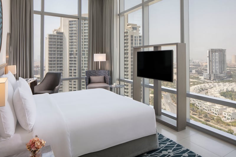 Guest rooms at The First Collection at Jumeirah Village Circle offer views of the neighborhood, all the way to Dubai Marina.