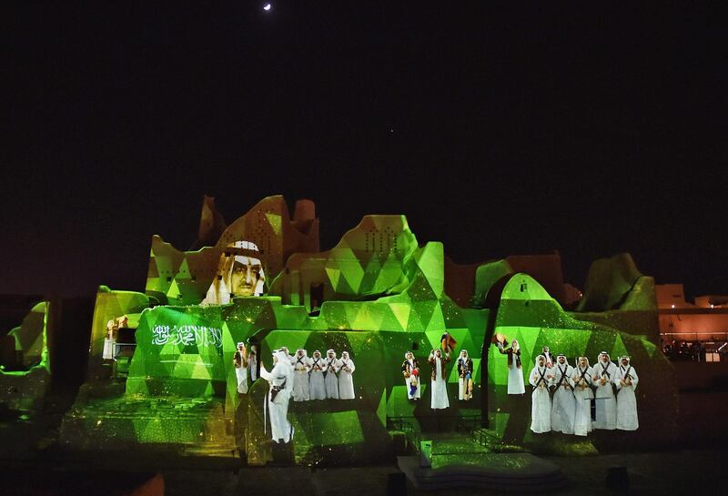 An animation is projected at the historical site of al-Tarif in Diriyah district, on the outskirts of Saudi capital Riyadh. Saudi Arabia hosts the G20 summit on November 21 in a first for an Arab nation, with the downsized virtual forum dominated by efforts to tackle a resurgent coronavirus pandemic and crippling economic crisis. AFP