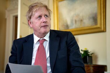 Britain's Prime Minister Boris Johnson speaks from 10 Downing Street praising NHS staff in a video message. AP Photo