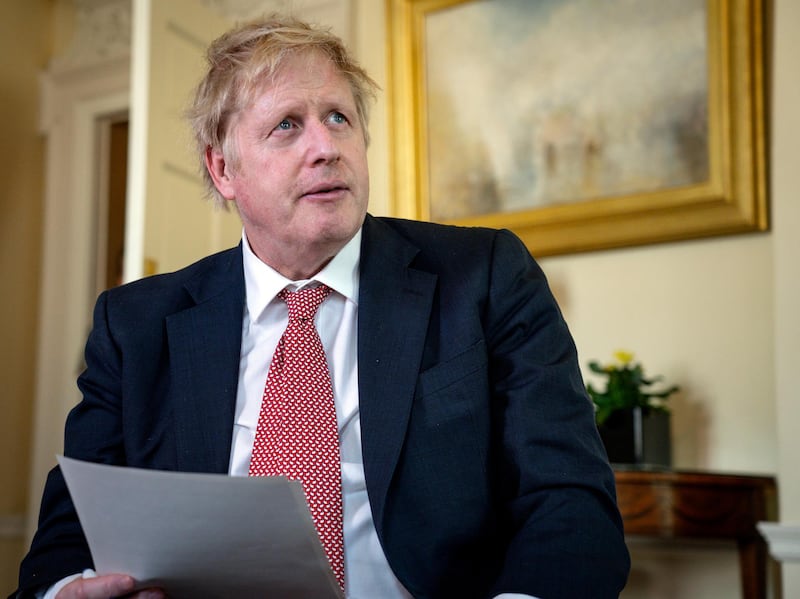 In this handout photo issued by 10 Downing Street, Britain's Prime Minister Boris Johnson speaks from 10 Downing Street praising NHS staff in a video message, after he was discharged from hospital a week after being admitted with persistent coronavirus symptoms, in London, Sunday, April 12, 2020. British Prime Minister Boris Johnson is praising the National Health Service staff for saving his life in a video on Twitter after his discharge from St. Thomasâ€™ Hospital in London. He said he did not have the words to properly thank the staff at NHS for â€œsaving my life.â€ He lauded two nurses Johnson said stood by his bedside for 48 hours â€œwhen things could have gone either way.â€ (Pippa Fowles/10 Downing Street via AP)